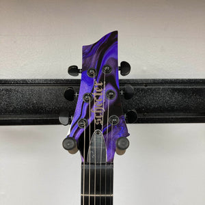 Schecter C-1 Hydro-Dip Purple Obsidian electric guitar headstock with a purple and black marbled finish and black tuning pegs.