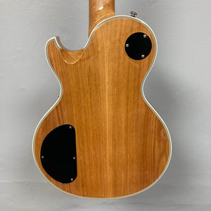 Back view of a Schecter Solo-II Custom Trans Black Burst electric guitar with white binding, two black plastic access panels, and premium Schecter USA Pasadena pickups. Includes case. Used.