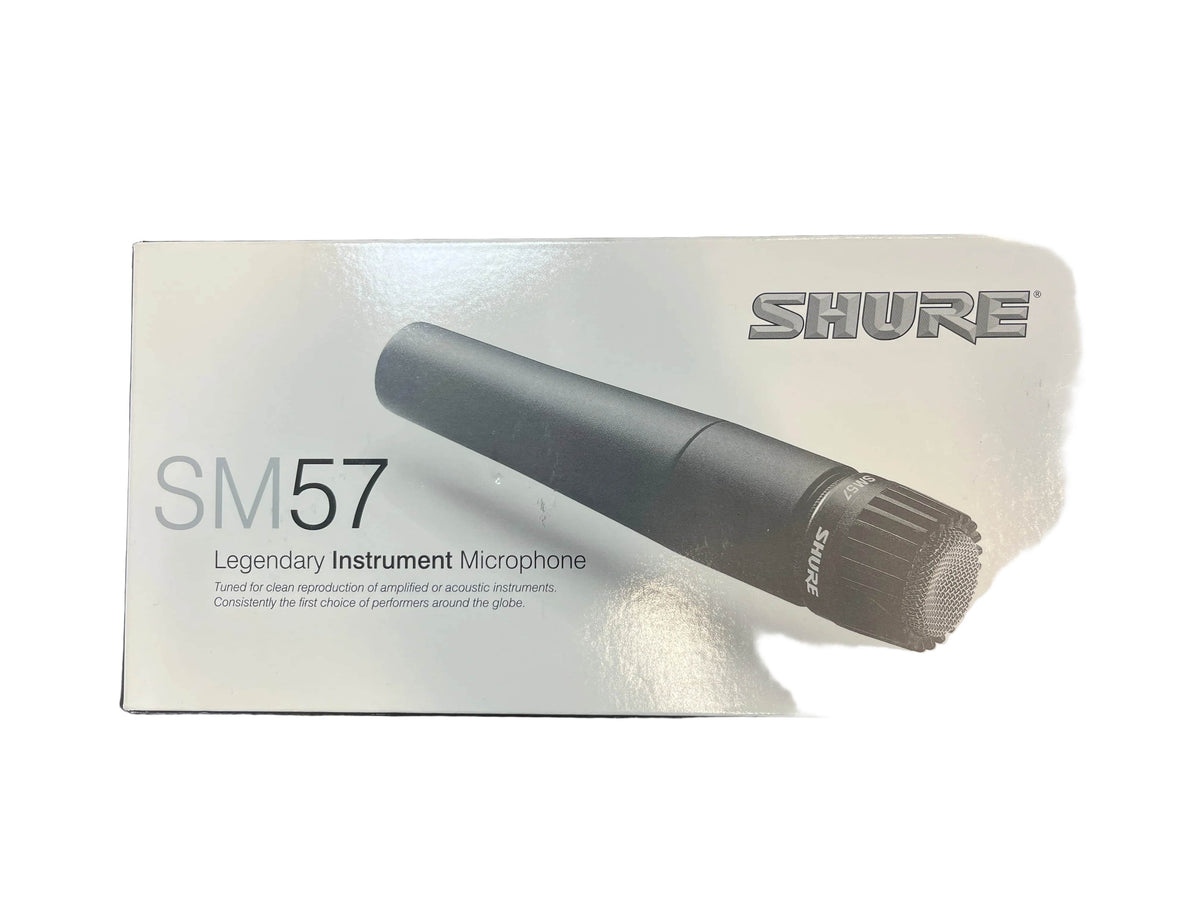 Shure SM57 microphone packaging on a textured surface