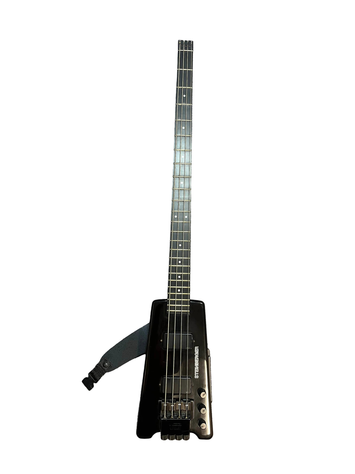 A 1984 Steinberger XL-2 Bass USA electric guitar by Steinberger, headless and black with four strings and an attached black strap, photographed against a white background.