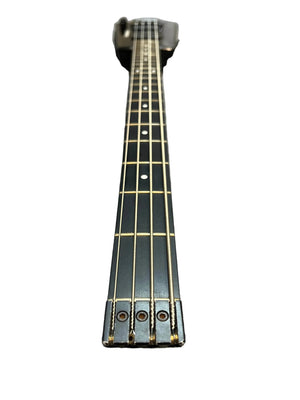Close-up of a 1984 Steinberger XL-2 Bass USA neck and fingerboard, featuring four strings and tuning pegs, by Steinberger, set against a white background.