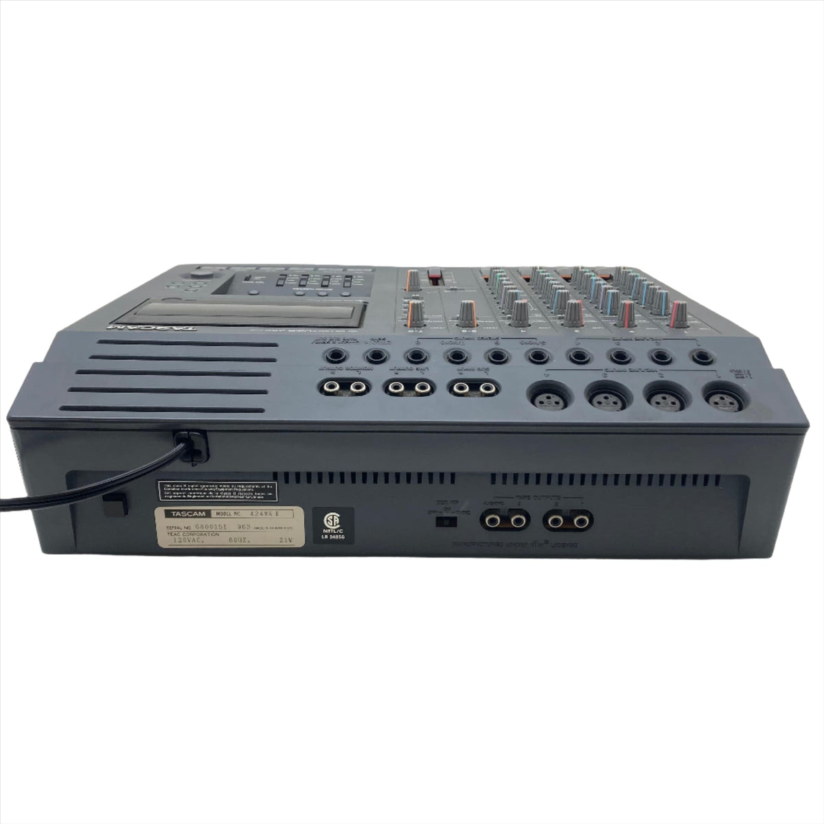 Tascam Portastudio 424 MKII Multi-Track Cassette Recorder, a grey audio mixer with buttons and knobs for hands-on analog recording and mixing.