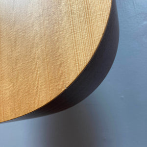 Close-up of a Taylor Academy 10e Acoustic-Electric Guitar w/GigBag Used body showing a small crack along the edge.