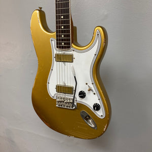 TopHat Stratavarius Aztec Gold Relic electric guitar with aged lacquer finish, Callaham tremolo, Gotoh tuners, and bluebird pickups.