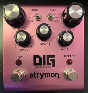 Strymon DIG Dual Digital Delay v1 USED: A pink effects pedal with multiple black and silver knobs, dials, and two footswitches for guitar sound design.