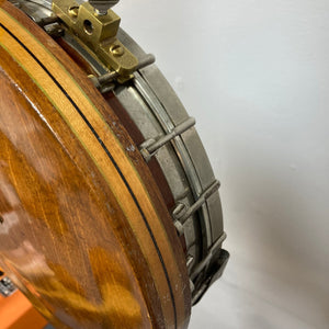 Close-up of the Vintage 1920-1930s Gretsch Broadkaster 4-String Tenor Banjo, highlighting its craftsmanship and iconic headstock inlay.