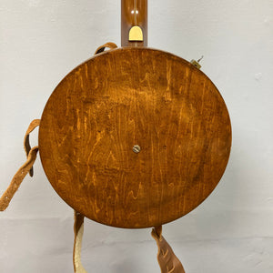 Close-up of a Vintage 1920-1930s Gretsch Broadkaster 4-String Tenor Banjo, showcasing its maple body, durable neck, and nickel-plated hardware.