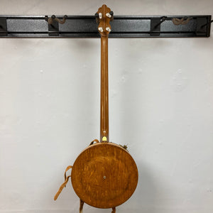 Vintage 1920-1930s Gretsch Broadkaster 4-String Tenor Banjo displayed prominently with detailed craftsmanship, including maple body and neck, vintage hardware, and iconic headstock.