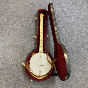 Vintage 1920-1930s Gretsch Broadkaster 4-String Tenor Banjo in a red-lined case, showcasing iconic headstock and nickel-plated hardware.