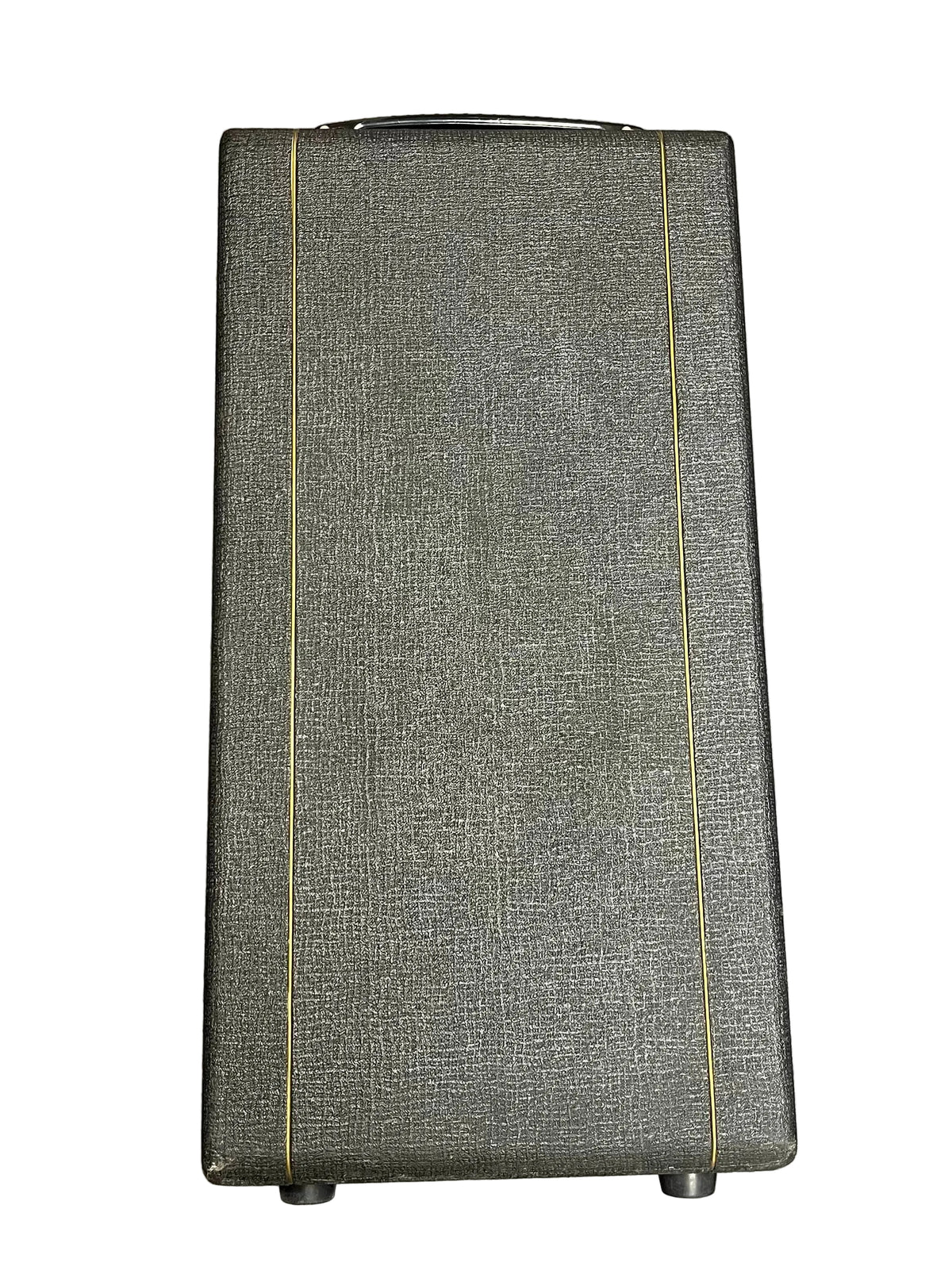 A rectangular, textured dark gray Vox flight case with two vertical yellow lines and a black top handle, inspired by the classic 1963 Vox AC30/6 Normal design, shown from the front.
