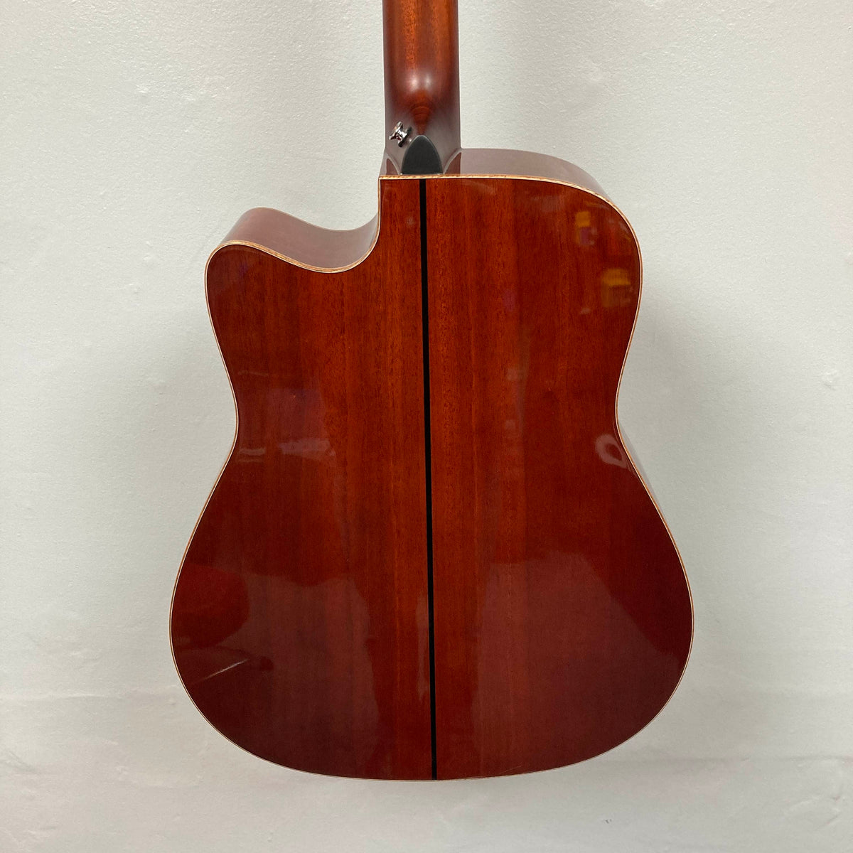 Back view of a Yamaha A3M ARE Vintage Natural Acoustic Guitar w/Hard Bag Used, showcasing its glossy, vintage natural wood finish and cutaway design, photographed against a plain white background. This Yamaha model is equipped with the advanced SRT2 pickup system for superior amplified sound quality.