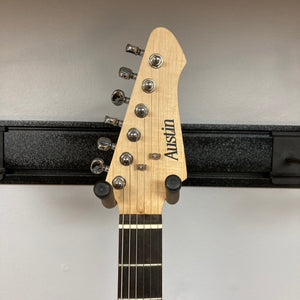 ZZ Top Signed Strat Style Guitar on a stand, showcasing signatures from Billy Gibbons, Dusty Hill, and Frank Beard.