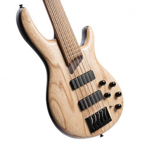 Close-up of the Cort Artisan B5 Element Natural bass guitar, highlighting its strings, pickups, and roasted maple fretboard.