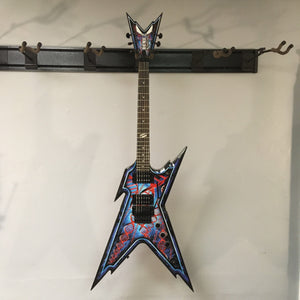 Dean Guitars Razorback Dimebag Floyd DNA Spatter, used, on a wall hook; notable for its balanced design and distinctive features.