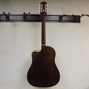 Epiphone Masterbilt J-45 EC Aged Vintage Sunburst Gloss guitar hung on a wall, showcasing its solid Sitka spruce top and mahogany body.