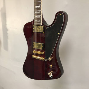 Close-up of ESP LTD Phoenix-1000 See Thru Black Cherry guitar showcasing the strings, pickups, and part of the body.