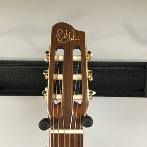 Close-up of the Godin Etude Classical Guitar, featuring a solid cedar top and rosewood fingerboard, showcasing its detailed craftsmanship and high-quality finish.