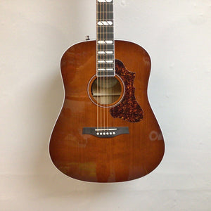 Godin Metropolis LTD Havana Burst HG EQ SF acoustic guitar with a small finish blemish near the sound hole, showcasing premium tonewoods and design.