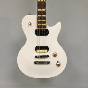 Godin Summit Classic HT Trans White electric guitar with gold knobs, brown strings, and carved maple top, ideal for versatile play.