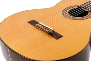 KNA NG-1 Piezo Pick-up for classical and flamenco guitar, close-up view showing its secure installation on the guitar’s tie bar.