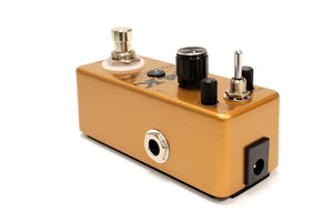 Outlaw 24K Reverb Guitar Pedal with knobs and switches, offering ROOM, PLATE, and SPRING reverb modes for versatile sound effects.