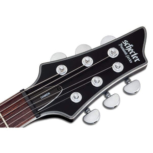 Damien Platinum-6 electric guitar close-up, showcasing its headstock, tuning pegs, and detailed craftsmanship.